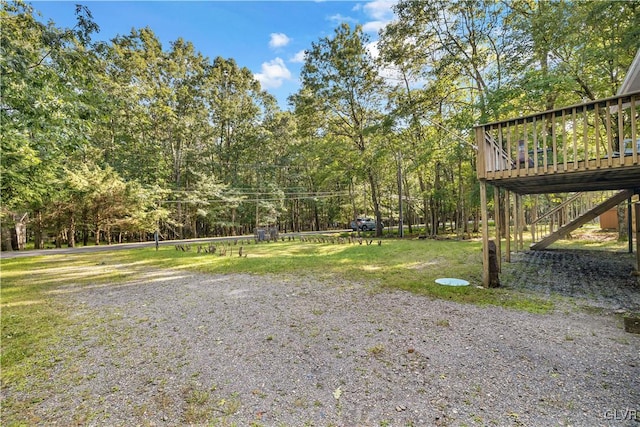 view of yard with a deck