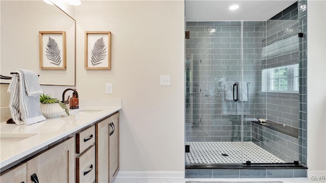 bathroom featuring vanity, tile patterned flooring, and an enclosed shower