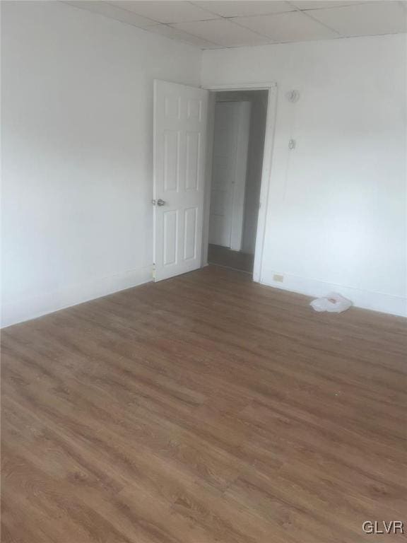 empty room featuring wood-type flooring