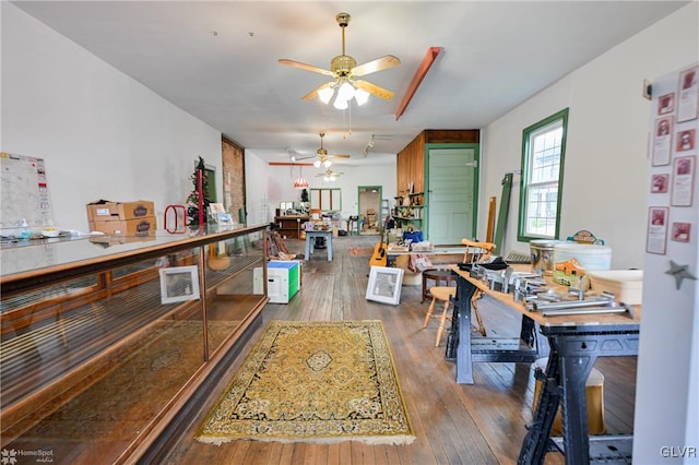 dining room featuring ceiling fan and wood-type flooring