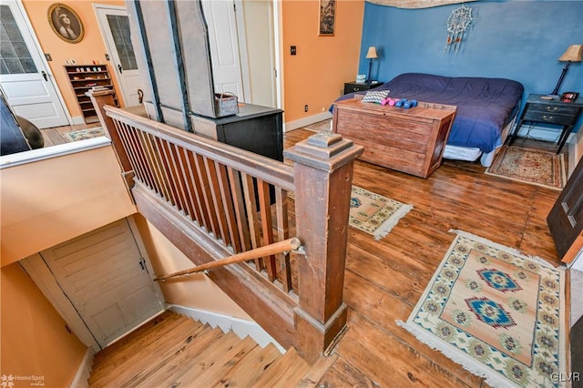 bedroom featuring hardwood / wood-style flooring