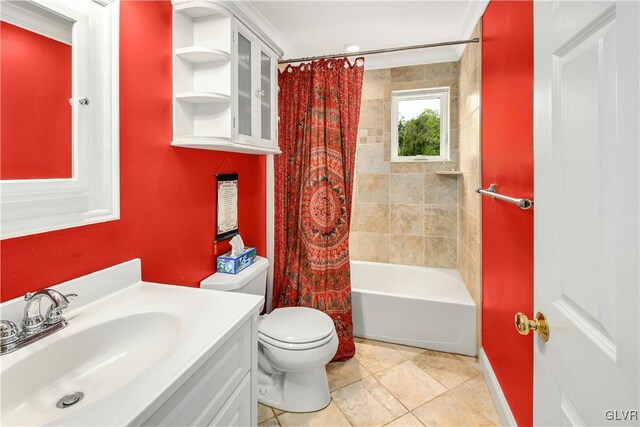 full bathroom featuring tile patterned flooring, shower / tub combo with curtain, toilet, and vanity