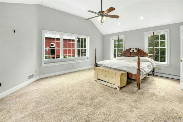 bedroom with ceiling fan, light carpet, and a baseboard radiator