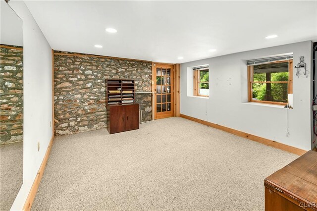 unfurnished living room with carpet