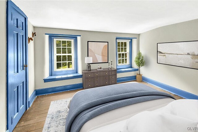 bedroom featuring hardwood / wood-style flooring