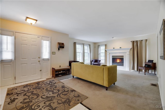 living room with light colored carpet