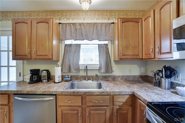 kitchen featuring sink and stainless steel dishwasher