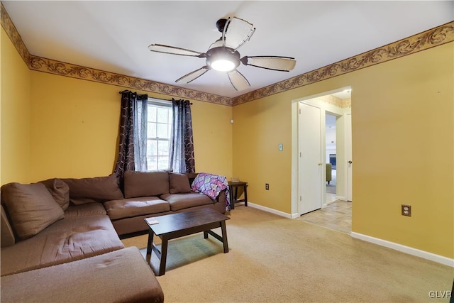 living room with ceiling fan and light carpet