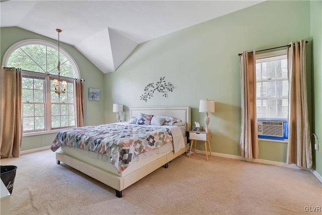 carpeted bedroom featuring vaulted ceiling