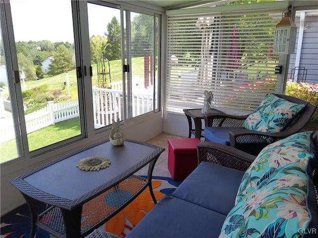 sunroom featuring plenty of natural light