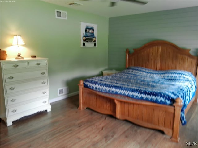 bedroom featuring ceiling fan and hardwood / wood-style flooring