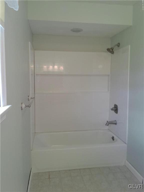 bathroom featuring washtub / shower combination