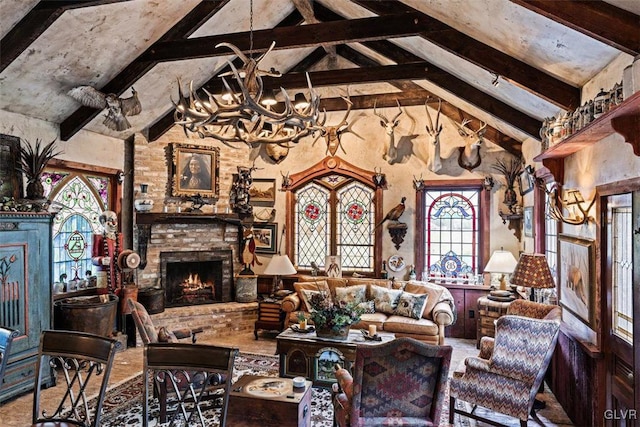 living room with high vaulted ceiling, an inviting chandelier, a fireplace, and beam ceiling