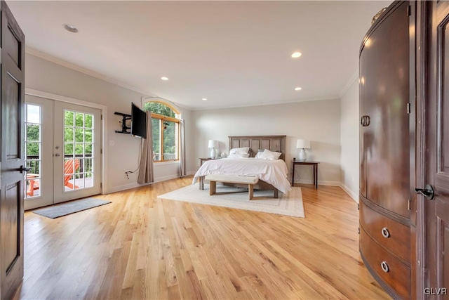 bedroom featuring light hardwood / wood-style flooring, crown molding, access to exterior, and french doors