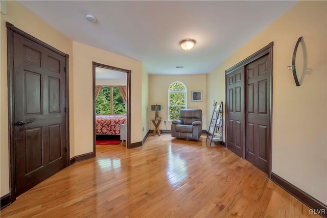 foyer entrance with light hardwood / wood-style floors