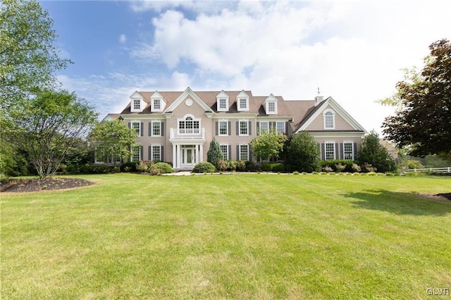 view of front of home with a front yard