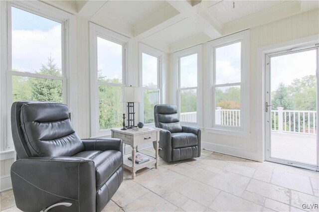 sunroom / solarium with plenty of natural light, coffered ceiling, and beamed ceiling