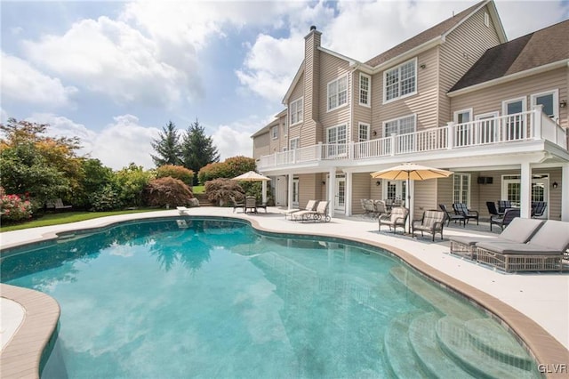 view of pool featuring outdoor lounge area and a patio area