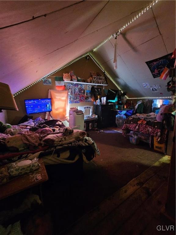 bedroom with lofted ceiling