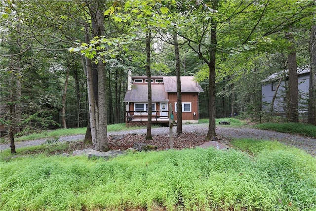 view of front of house featuring a wooden deck