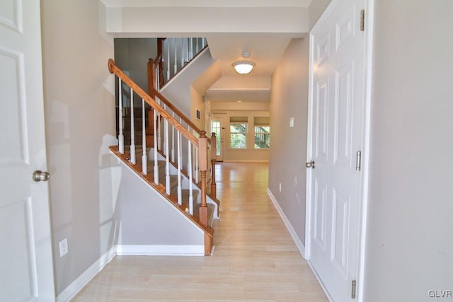 entrance foyer with light hardwood / wood-style floors