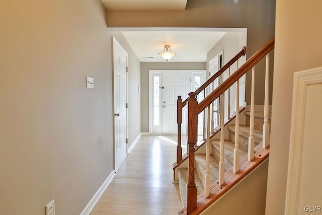 foyer with light wood-type flooring