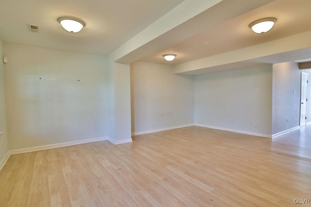 unfurnished room featuring light hardwood / wood-style floors