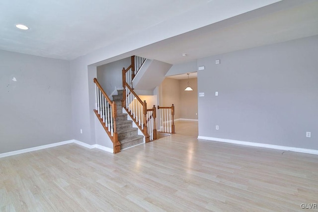 spare room featuring light hardwood / wood-style floors