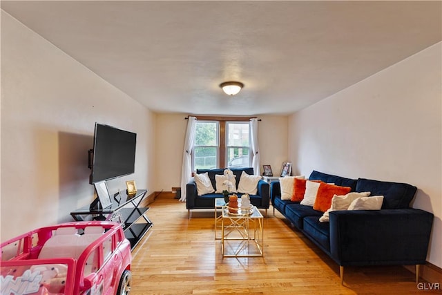 living room with light hardwood / wood-style floors