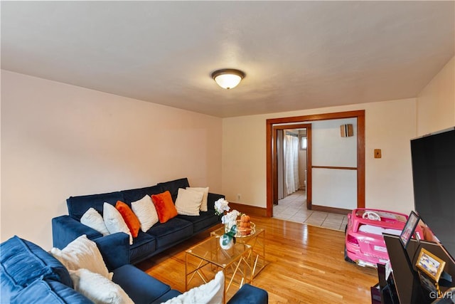 living room with light hardwood / wood-style flooring