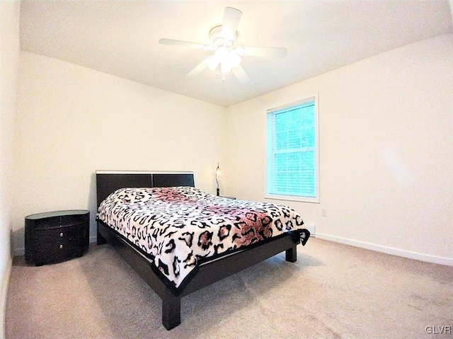 bedroom featuring carpet and ceiling fan