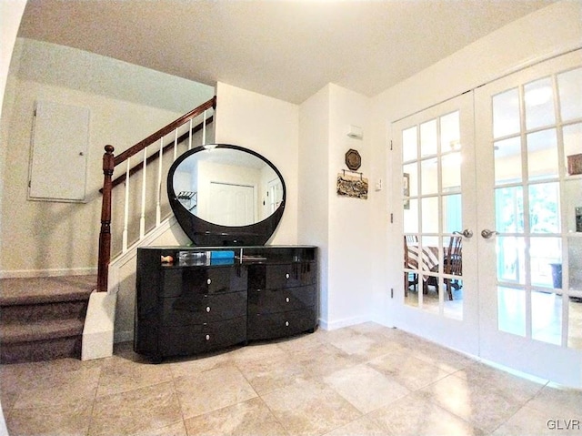 interior space with vanity and french doors