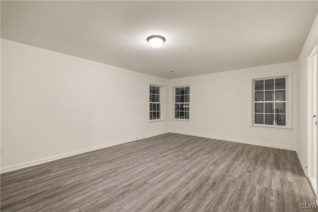 empty room with wood-type flooring