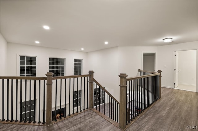 hall with dark hardwood / wood-style flooring