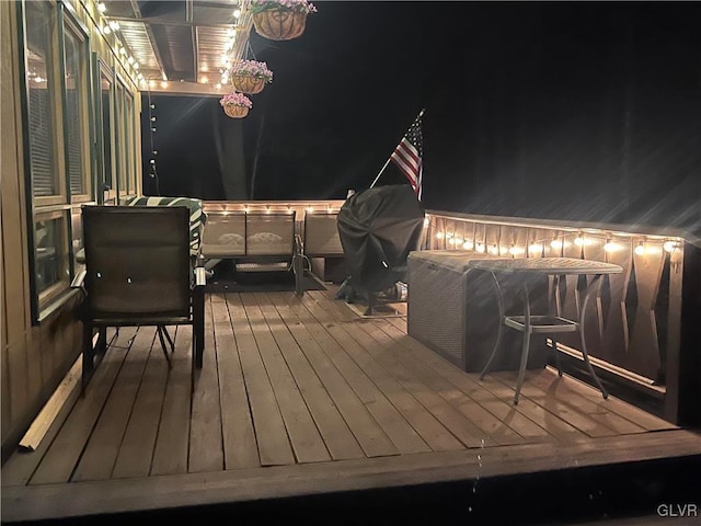 view of deck at night