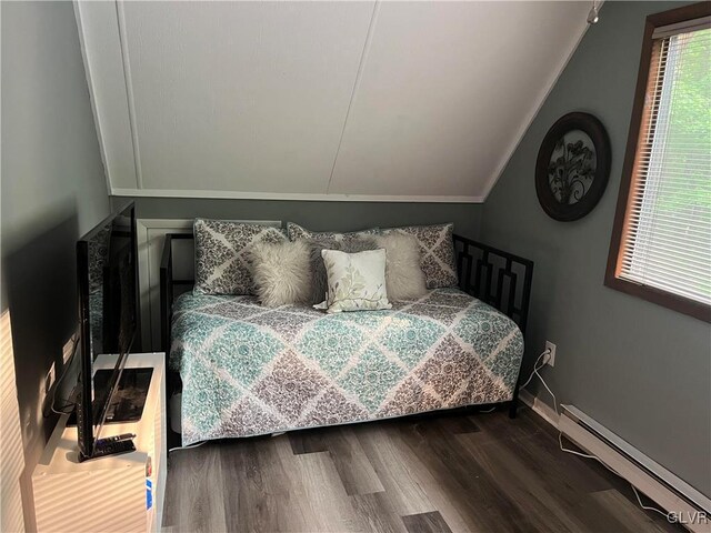 bedroom featuring a baseboard radiator and dark hardwood / wood-style floors