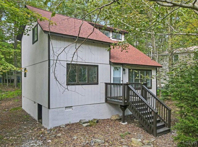 223 Wyalusing Dr, Coolbaugh Twp, PA 18347 - view of front of house featuring crawl space and a shingled roof