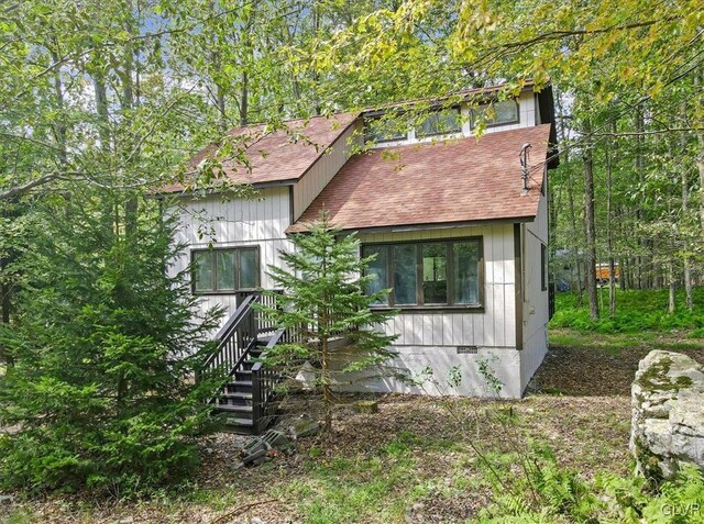 223 Wyalusing Dr, Coolbaugh Twp, PA 18347 - view of front of property featuring roof with shingles