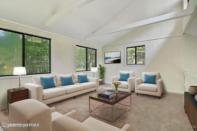 carpeted living room featuring vaulted ceiling and wooden walls