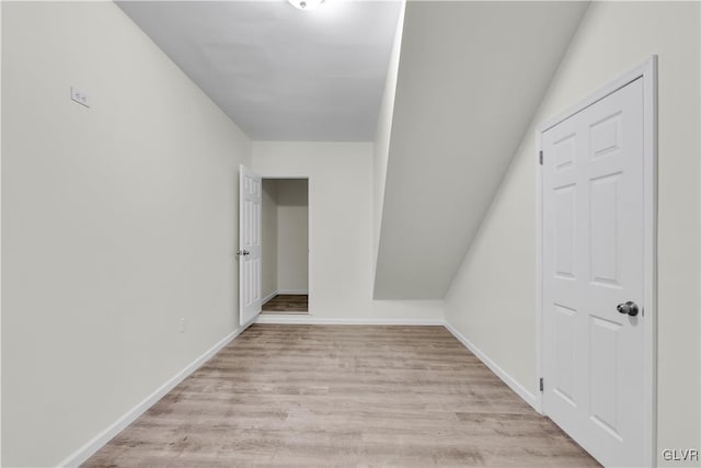 additional living space with light wood-type flooring