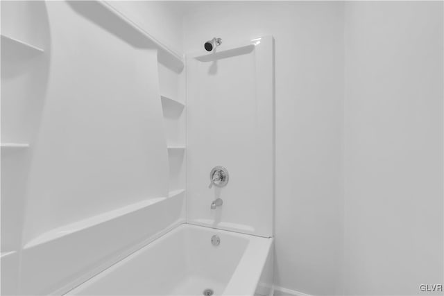 bathroom with shower / tub combination