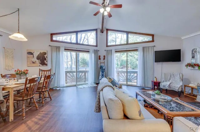 living room with vaulted ceiling with beams, ceiling fan, and wood finished floors