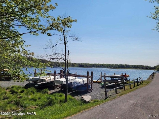 view of dock featuring a water view