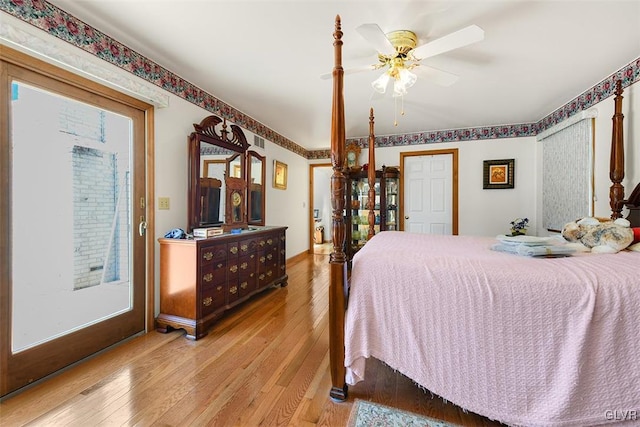 bedroom featuring light hardwood / wood-style flooring and ceiling fan