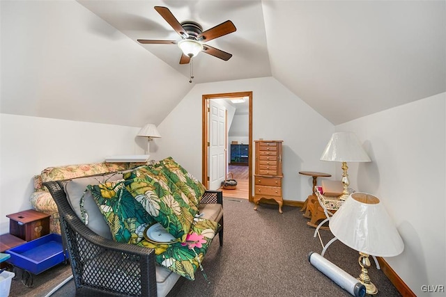 bedroom with lofted ceiling, ceiling fan, and carpet floors