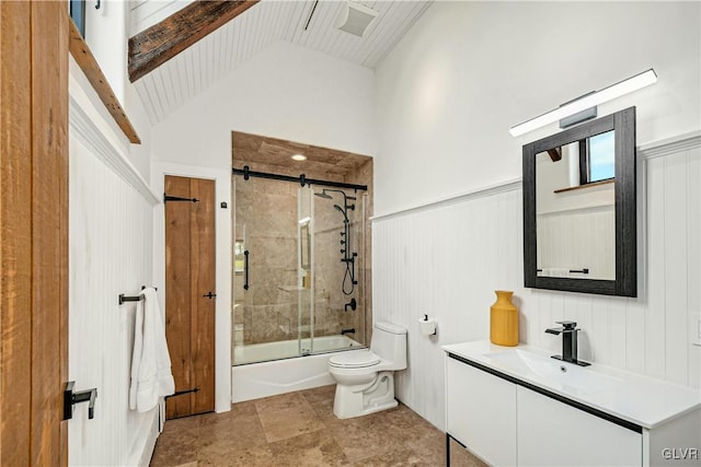 full bathroom with vanity, toilet, vaulted ceiling, and enclosed tub / shower combo