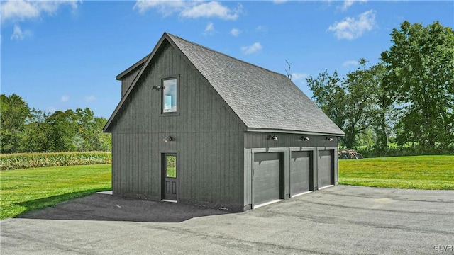 view of outdoor structure with a yard