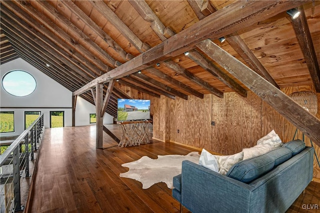 unfurnished living room with wood ceiling, vaulted ceiling with beams, wood walls, and dark hardwood / wood-style flooring