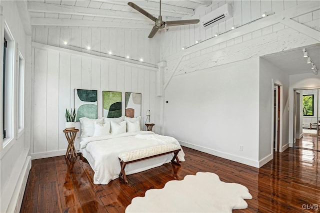 bedroom with ceiling fan, a wall unit AC, dark hardwood / wood-style floors, and a baseboard radiator