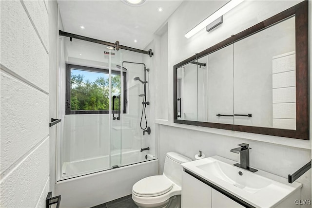 full bathroom featuring vanity, toilet, and enclosed tub / shower combo